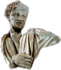 A headless statue holding a head